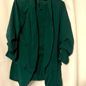Brand new beautiful Bold Green suit with high waisted ruffled top pants size (M)